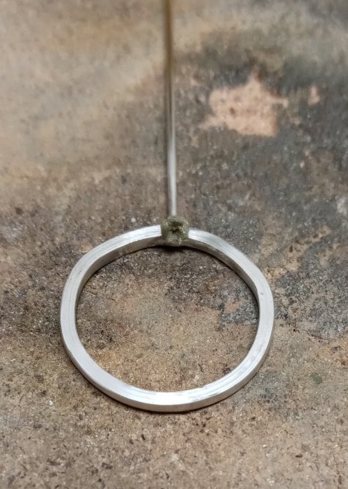 Judy Larson's Fun Shapes Fish Hook Earrings - , Contemporary Wire Jewelry, Butane Torch, Soldering, Solder, Design, Lightly press a 1.5mm dot into the solder. Heat until the solder flows.